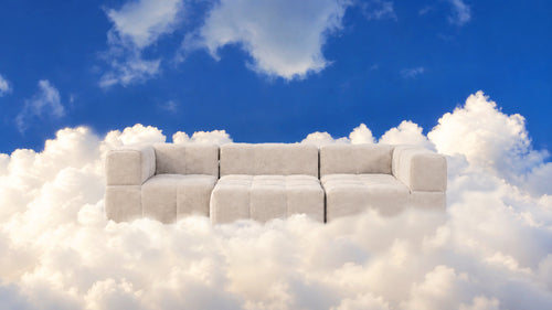 Modulares Sofa Sand im 5er-Set vor Wolkenhintergrund